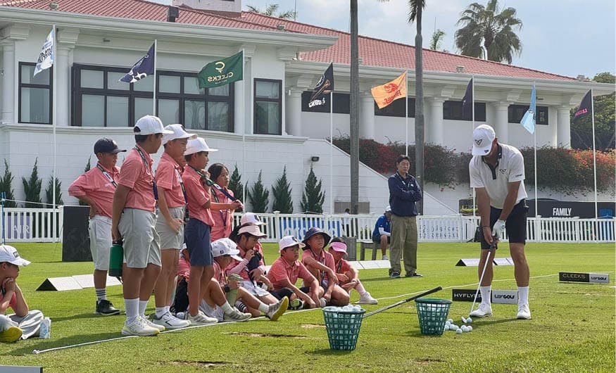 A group of people are watching a man play golf. AI generated content