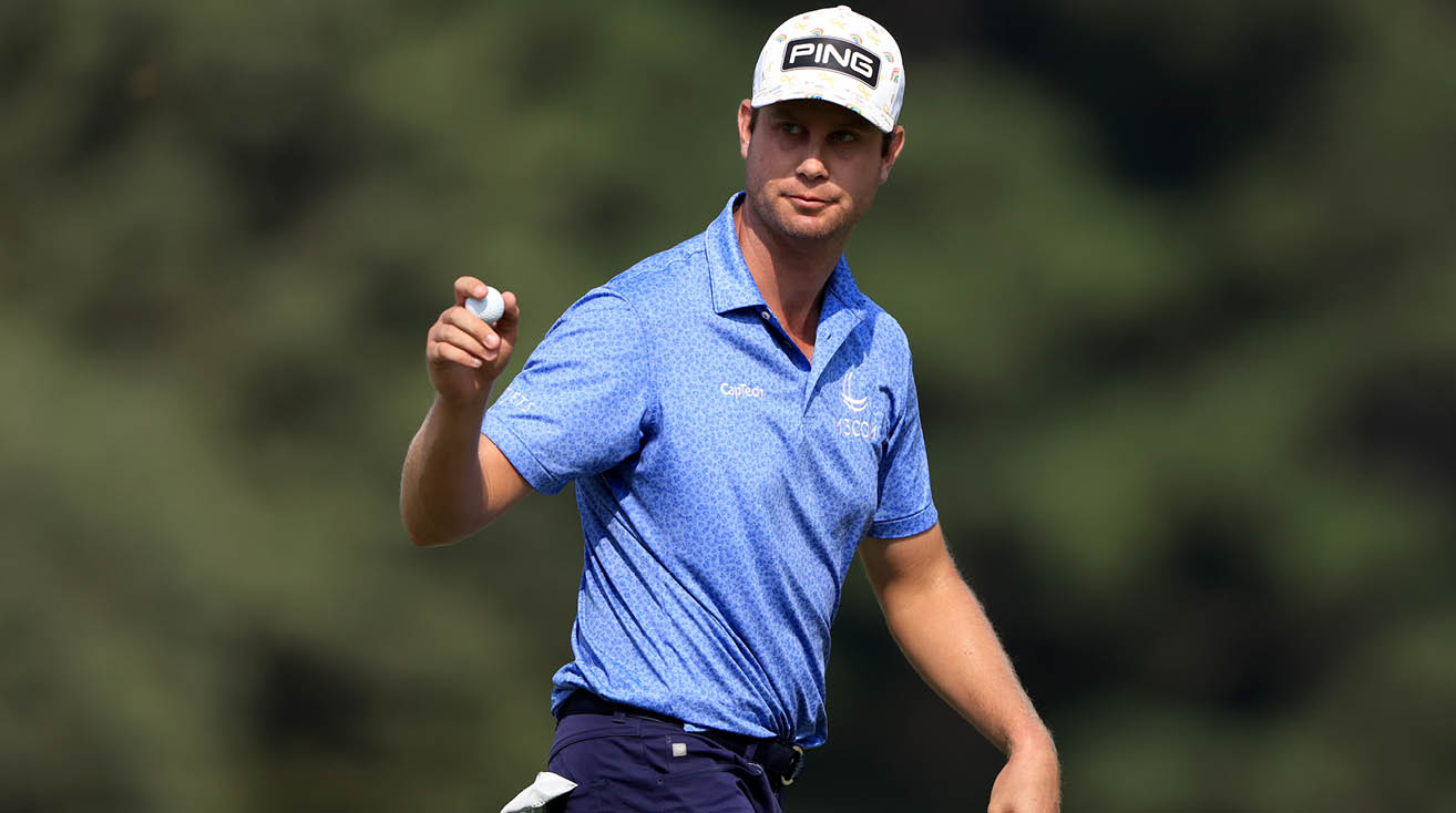 MEMPHIS, TENNESSEE - AUGUST 07: Harris English acknowledges the crowd on the 16th hole during the third round of the World Golf Championship-FedEx St Jude Invitational at TPC Southwind on August 07, 2021 in Memphis, Tennessee  (Photo by Sam Greenwood Getty Images)