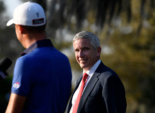 PONTE VEDRA BEACH, FL - MARCH 14: PLAYERS Champion Justin Thomas talks with the media as PGA TOUR Commissioner Jay Monahan looks on during the final round of THE PLAYERS Championship on THE PLAYERS Stadium Course at TPC Sawgrass on March 14, 2021, in Ponte Vedra Beach, FL  (Photo by Stan Badz PGA TOUR via Getty Images)